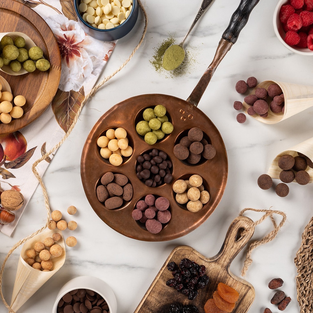 KOLEKCJA BAKALII NUTTY QUATTRO - skórka pomarańczy w deserowej czekoladzie (57% kakao) z nutą Earl Grey