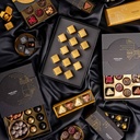 KOLEKCJA GOLDEN RINGS - bakalie: migdał w mlecznej czekoladzie (33% kakao) oprószony cynamonem, orzech laskowy w deserowej czekoladzie (57% kakao) oprószony karmelem